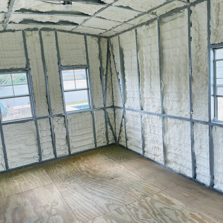 Closed-cell spray foam insulation applied to wall cavities in a residential project in Dodgeville